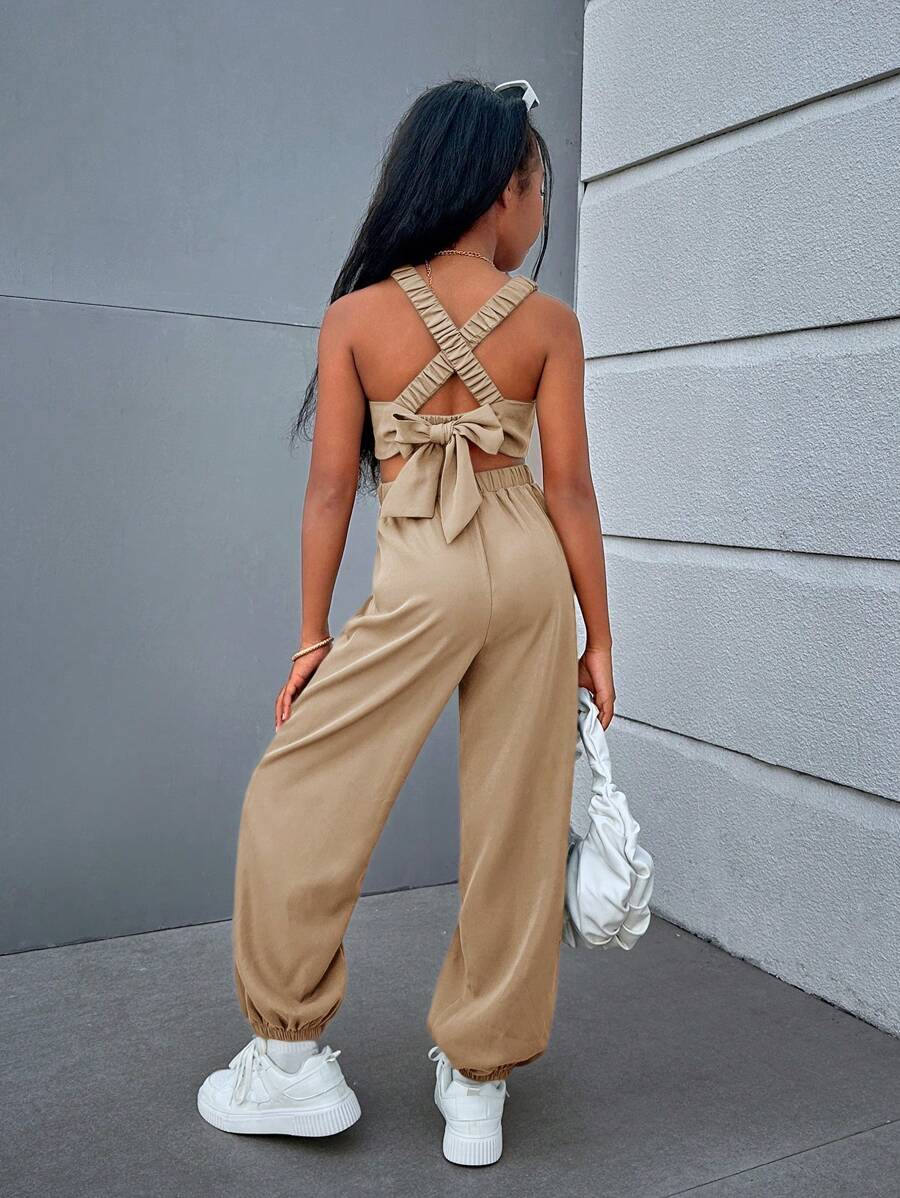 SHEIN Trendy Tween Girl geweven effen kleur jumpsuit met gekruiste rugbanden, mouwloos voor lente/zomer casual streetstyle