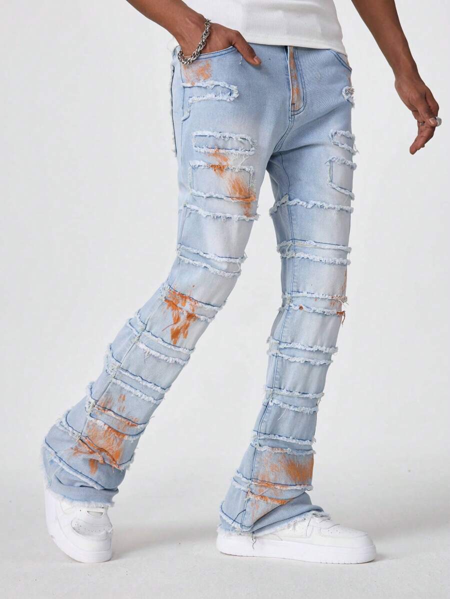 Manfinity EMRG Pantalones vaqueros de campana desgastados de color azul claro desteñido para hombre