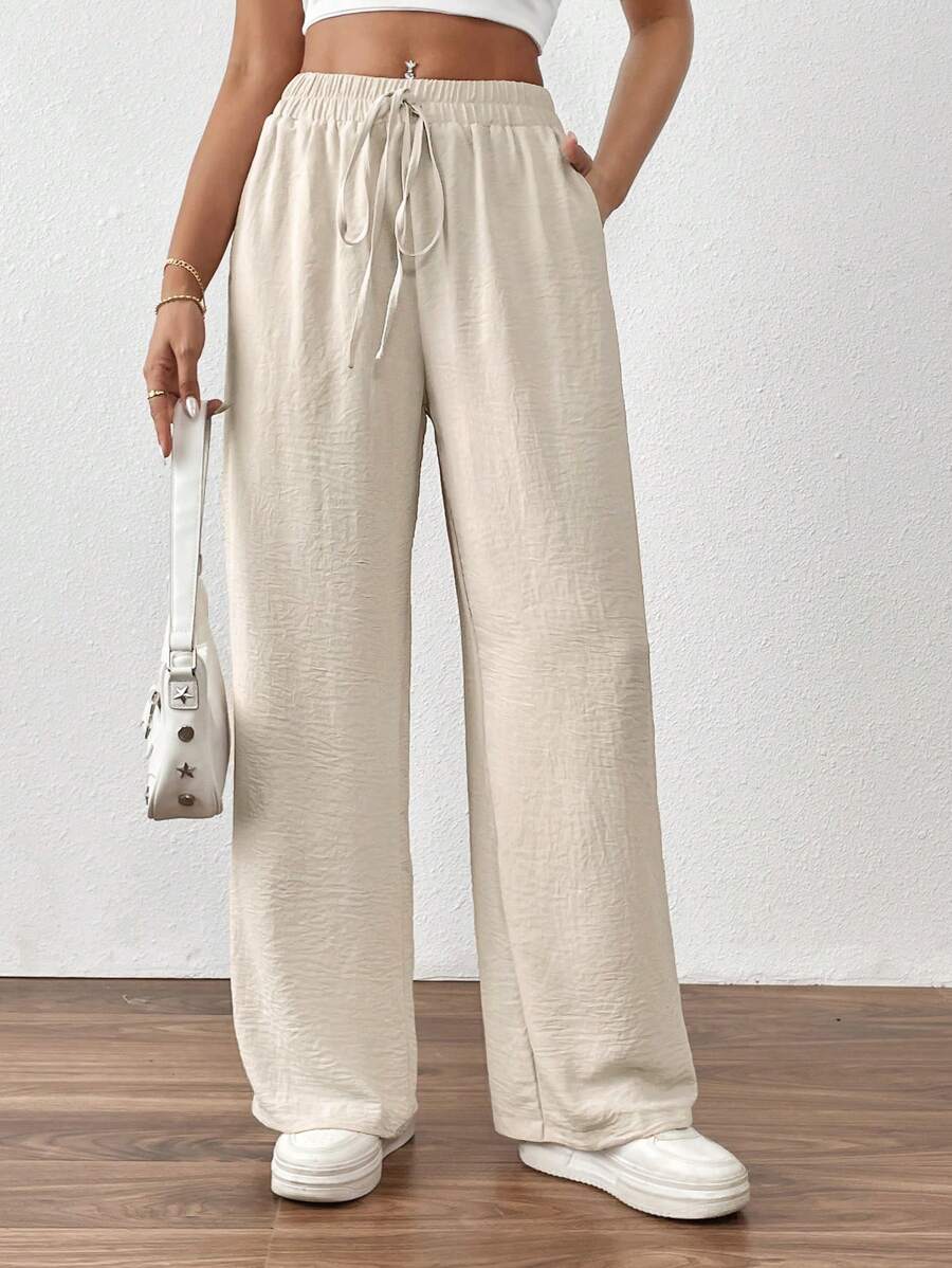 SHEIN PETITE Pantalon décontracté à poche torsadée de couleur unie pour femmes