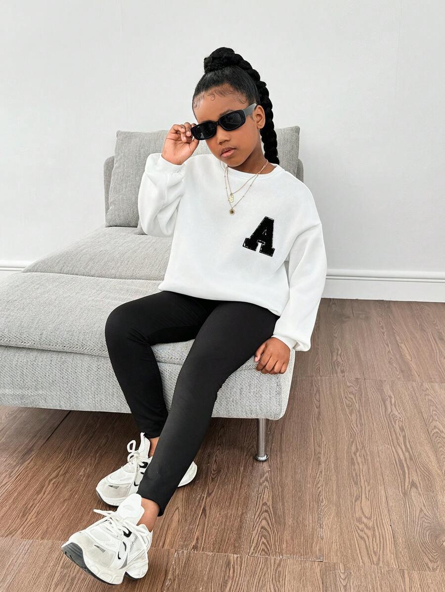 SHEIN Conjunto informal de 2 piezas de niña preadolescente con sudadera de cuello redondo holgada con parche de letras y manguitas caídas, talla grande mallas, conjunto de vuelta al colegio