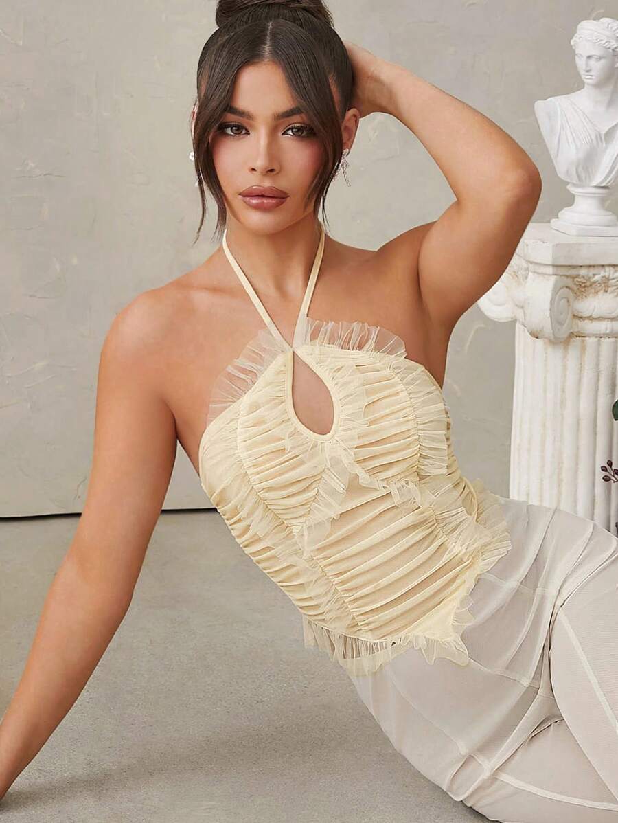 L'Amorae Blusa transparente con volantes