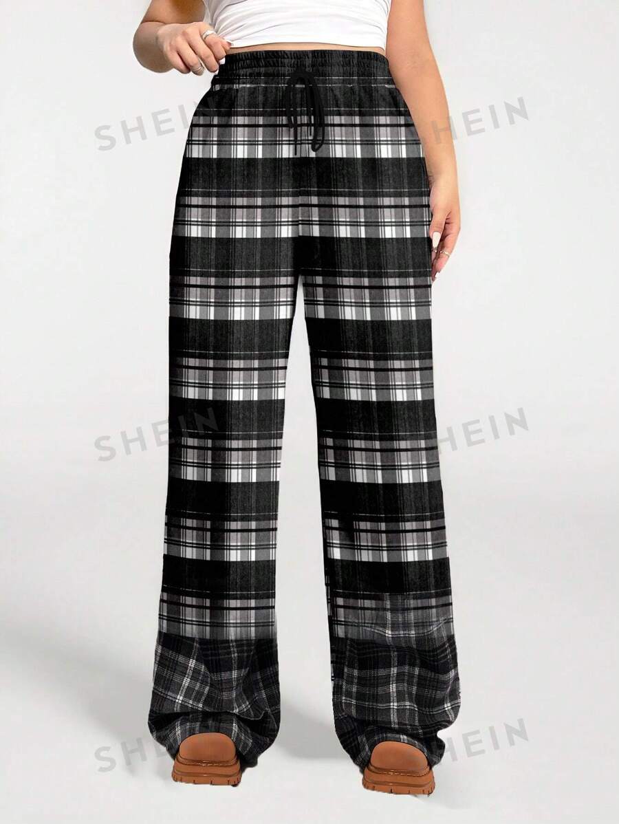 SHEIN EZwear Pantalones sueltos y cálidos de talla grande con estampado a cuadros negro y blanco de estilo casual, aptos para otoño/invierno