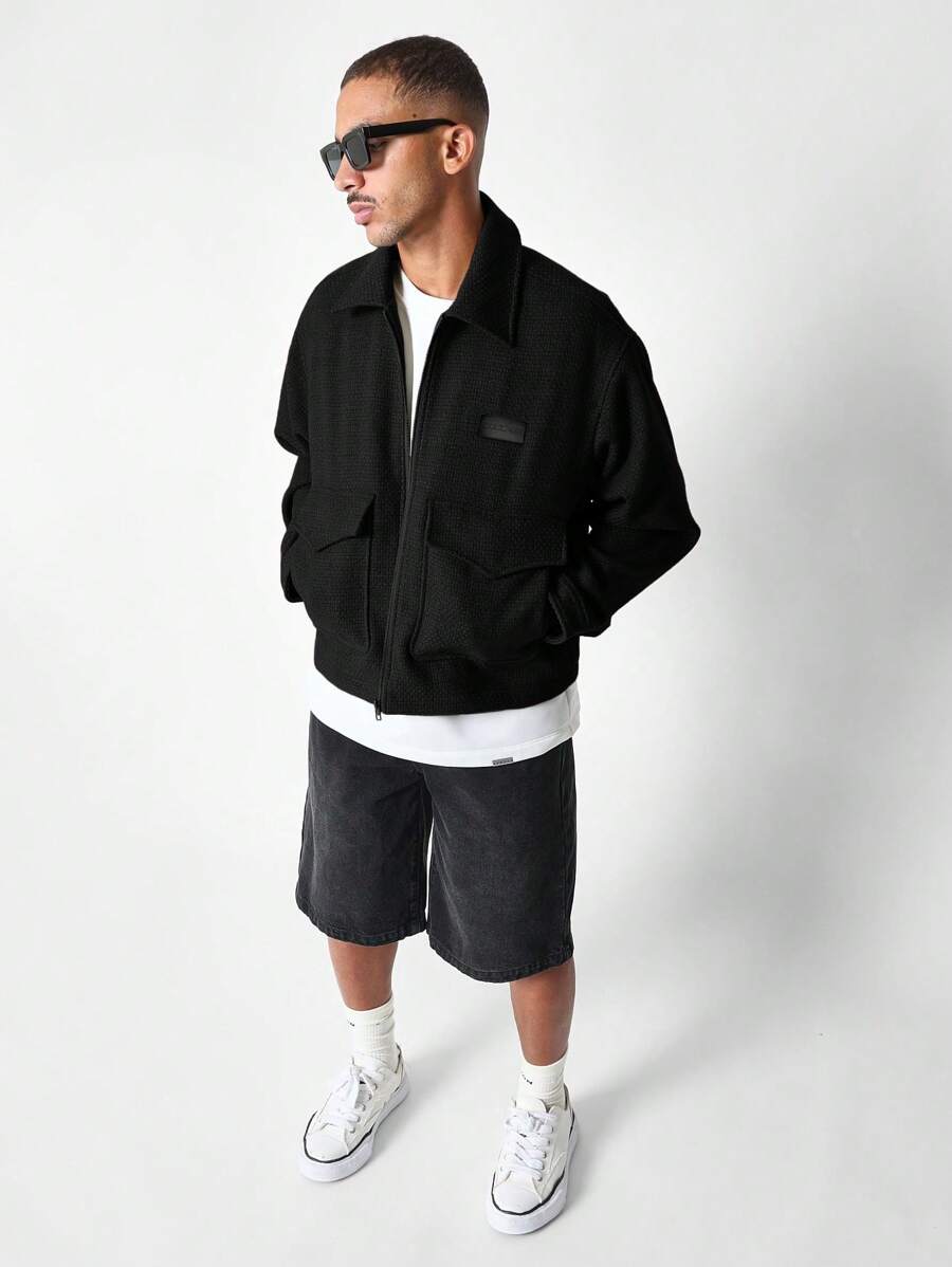 SUMWON Veste d'hiver de style streetwear bomber utilitaire texturée, oversize avec fermeture éclair avant, grandes poches avant. Style décontracté, moderne et urbain
