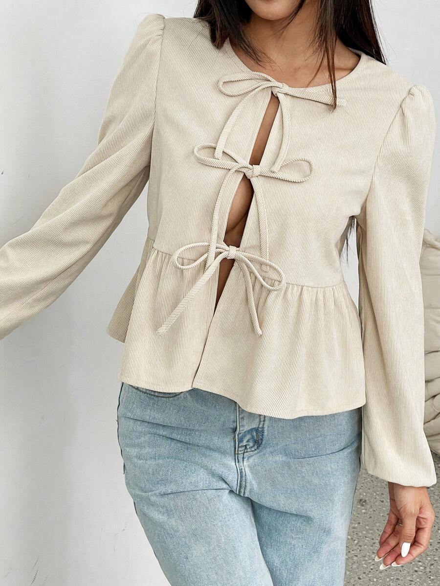 Flirla Blusa de manga larga con cuello redondo, dobladillo con volantes y lazo delantero, color liso