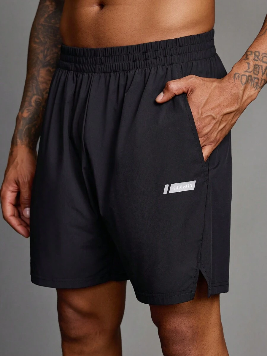 Manfinity Sport Corelite Herren Freundin Stil Shorts mit elastischem Bund, geometrischem Muster und Taschen, Lässig Fitness Shorts