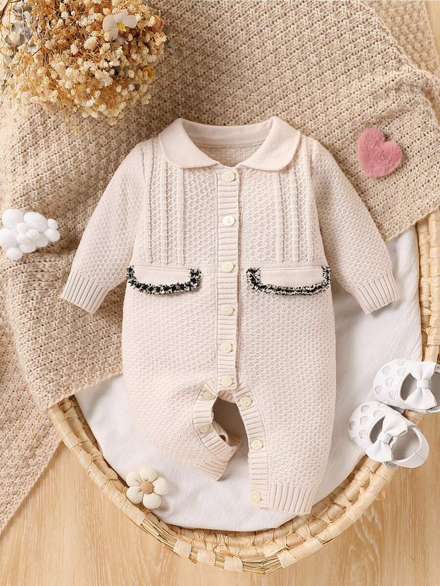 Mono de punto de moda y lindo todo a juego para niña bebé, mono de una sola pieza de manga larga blanco con diseño simple pero elegante con decoración de lazo negro en el pecho