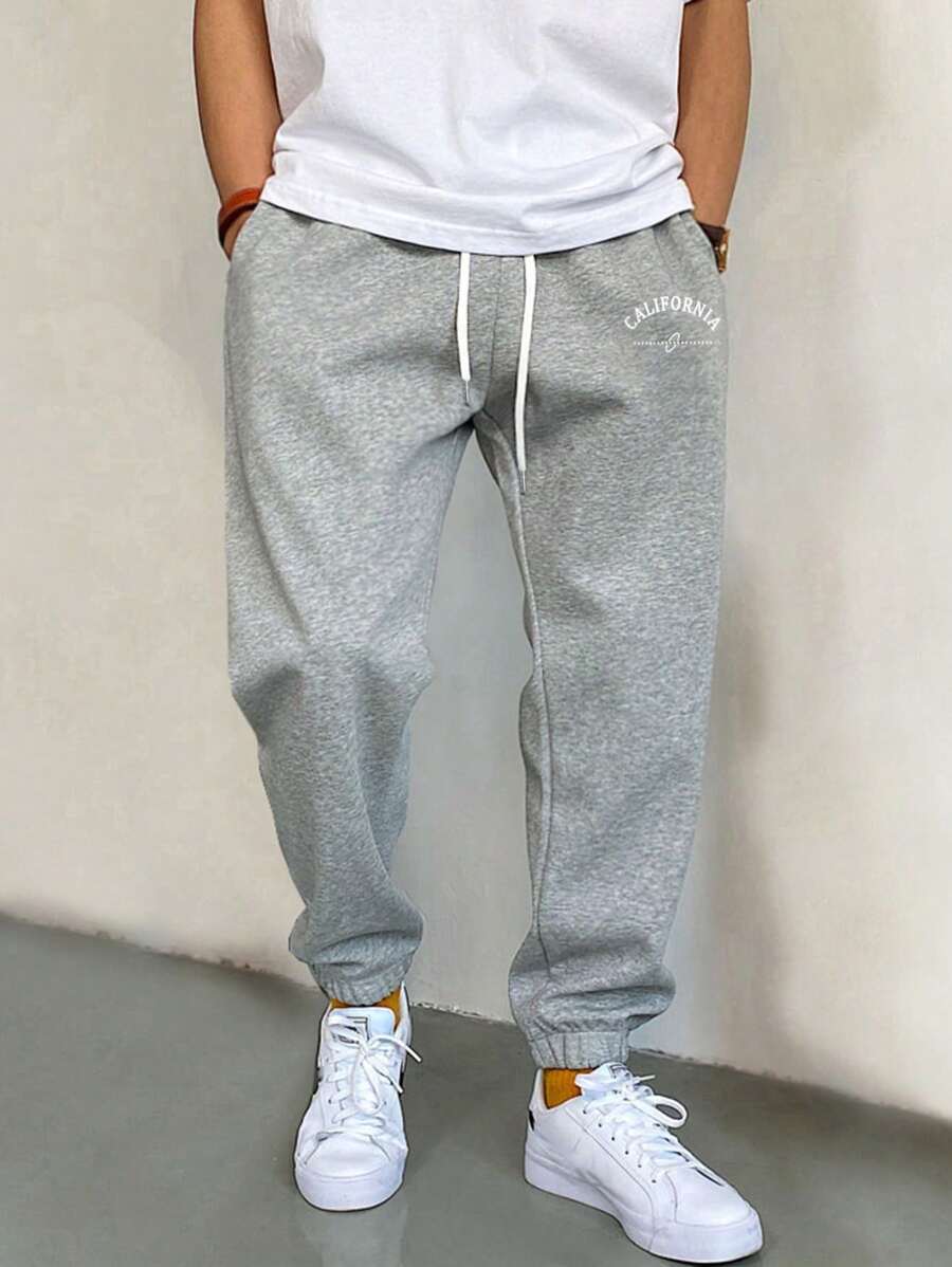 Manfinity Hypemode Men's Letter Print Pouch Drawstring Waist Sweatpants