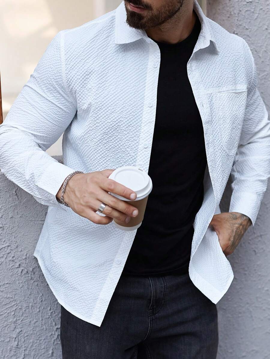 Manfinity Homme Camisa casual de manga larga de botones de un solo color con bolsillo para hombres