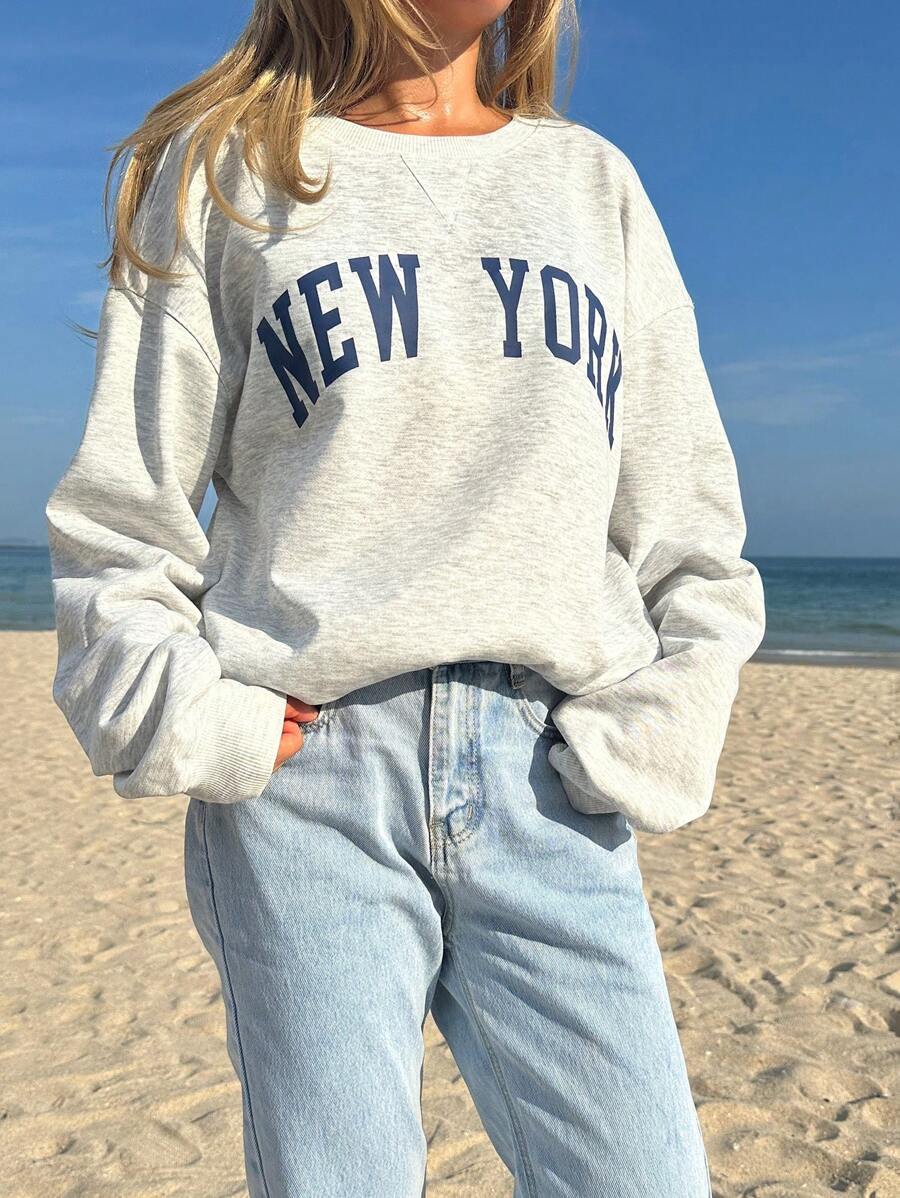 SHEIN EZwear Casual Solid Color Knitted Round Neck Loose Fit Women Sweatshirt With Front Center Print,Long Sleeve Tops