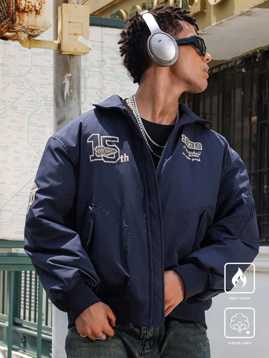 Manfinity EMRG Abrigo casual acolchado de cuello alto con cremallera frontal, manga larga y estampado de letras para hombres, ropa de vuelta al colegio, chaqueta bomber