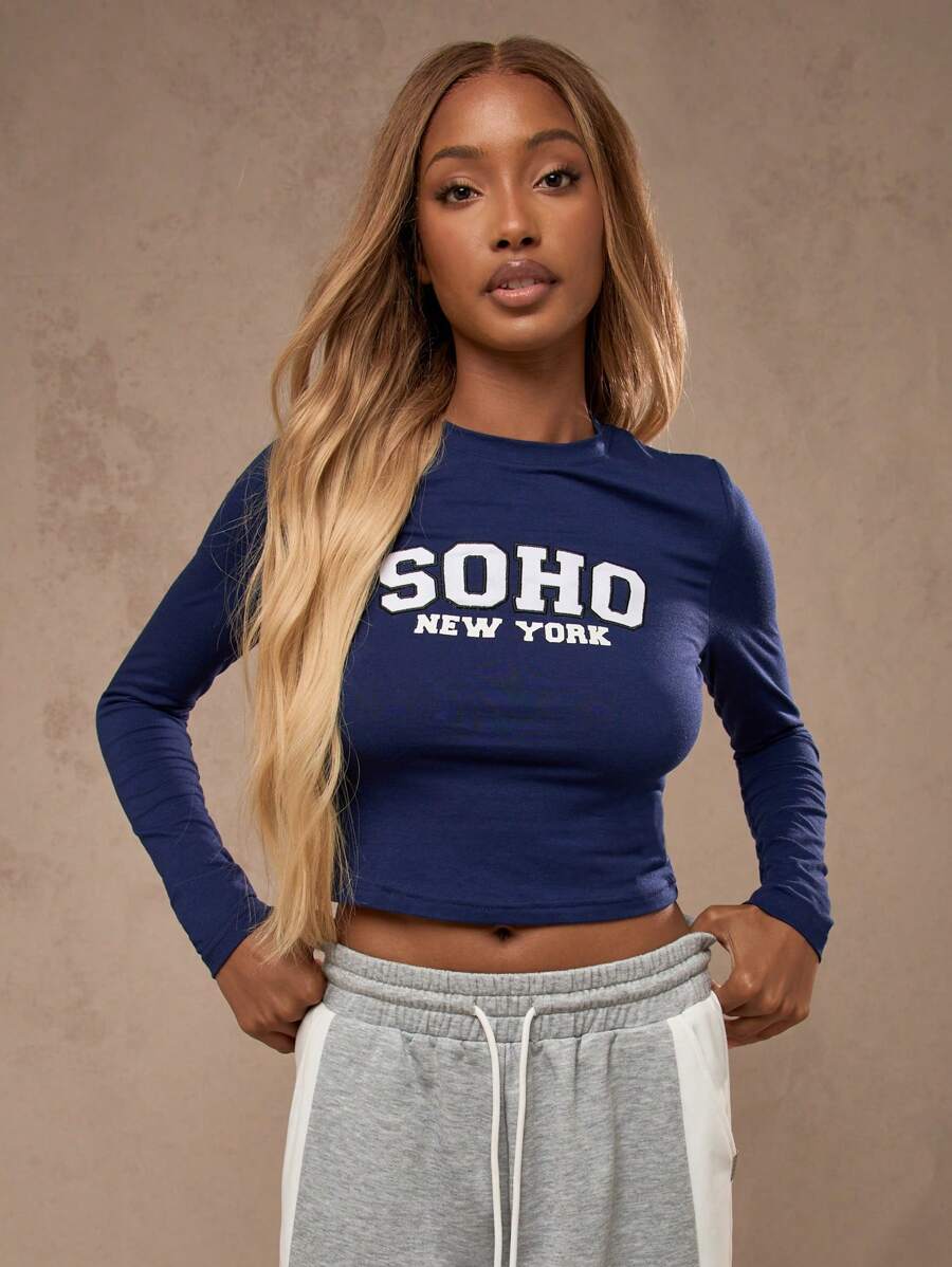 MISSGUIDED Varsity lange mouwen getailleerd "SOHO New York" bedrukte voorkant top