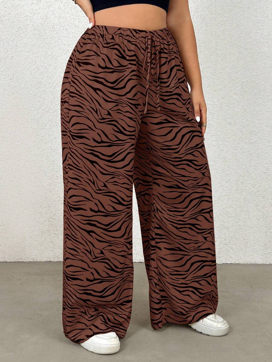 SHEIN EZwear Pantalones rectos con estampado de cebra de talla grande, estilo casual