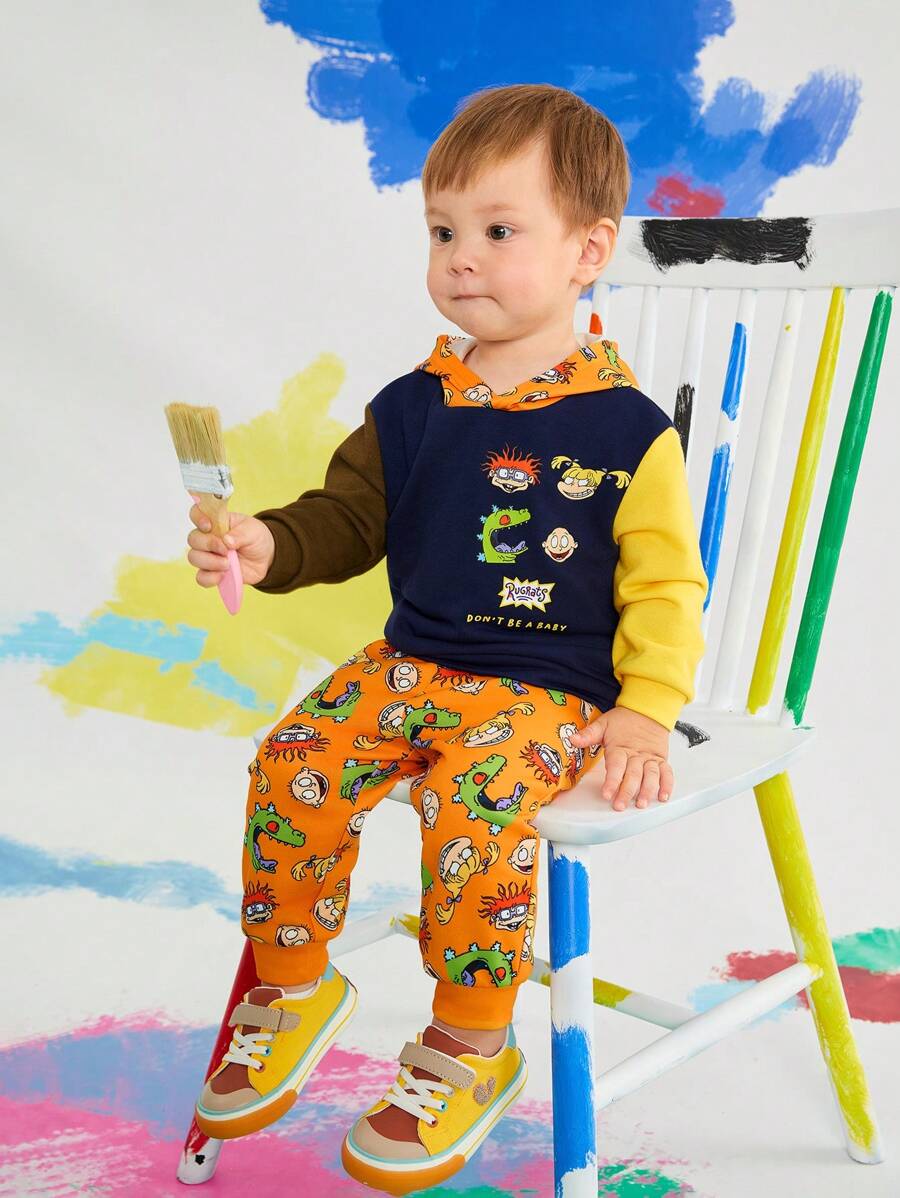 Nick 90s X SHEIN Tuta da 2 pezzi composta da felpa con cappuccio e pantaloni garzati a blocchi di colore con grafica di dinosauro per bambini maschi