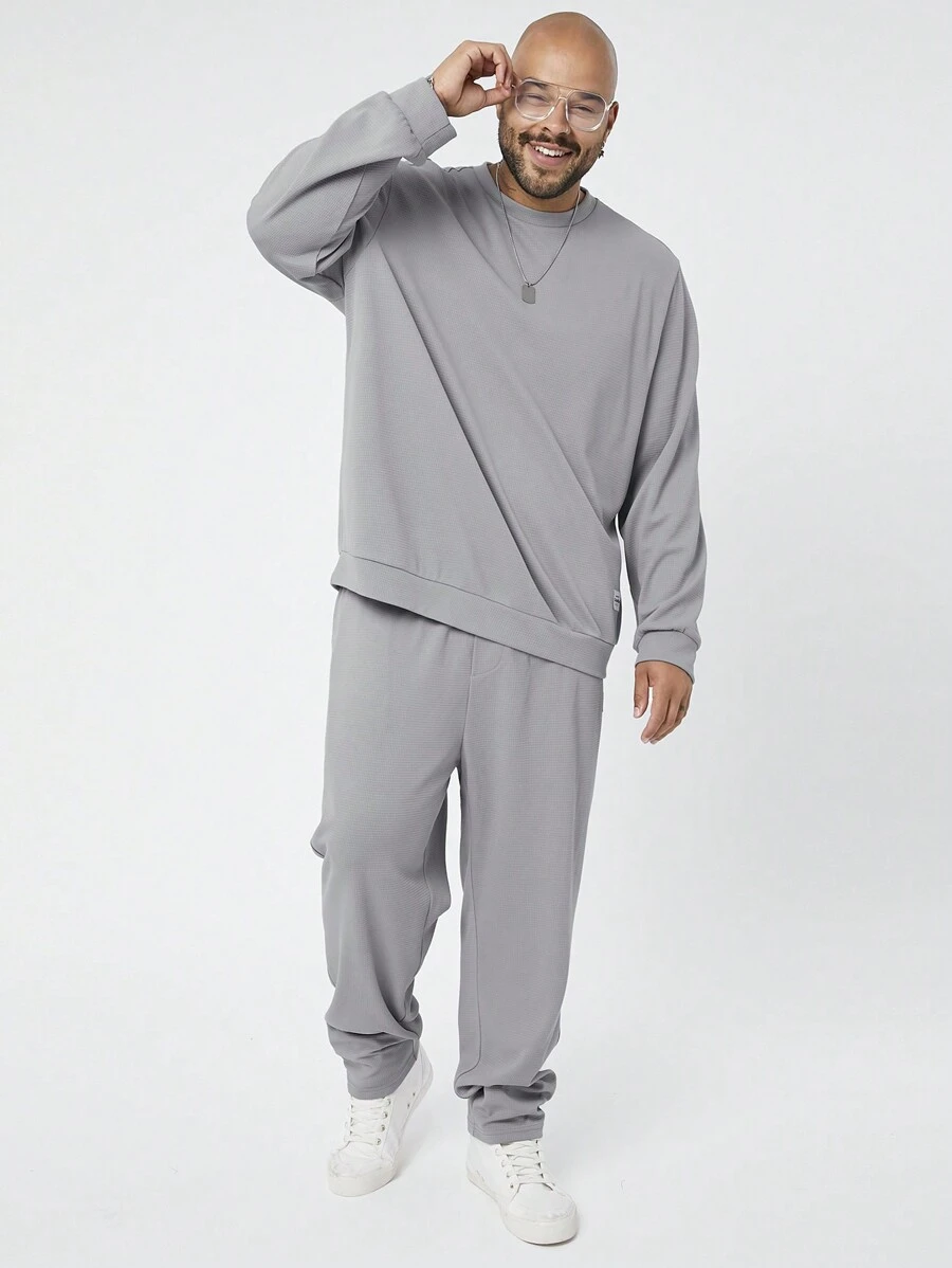 Manfinity NXTstreet Set de 2 piezas de sudadera de cuello redondo y pantalones de punto de talla grande para hombres