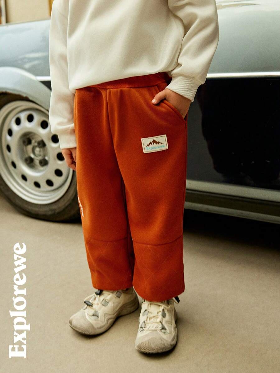 SHEIN Set de 2 pantalones de felpa informales con cintura elástica y decoración de dibujos animados para niño joven