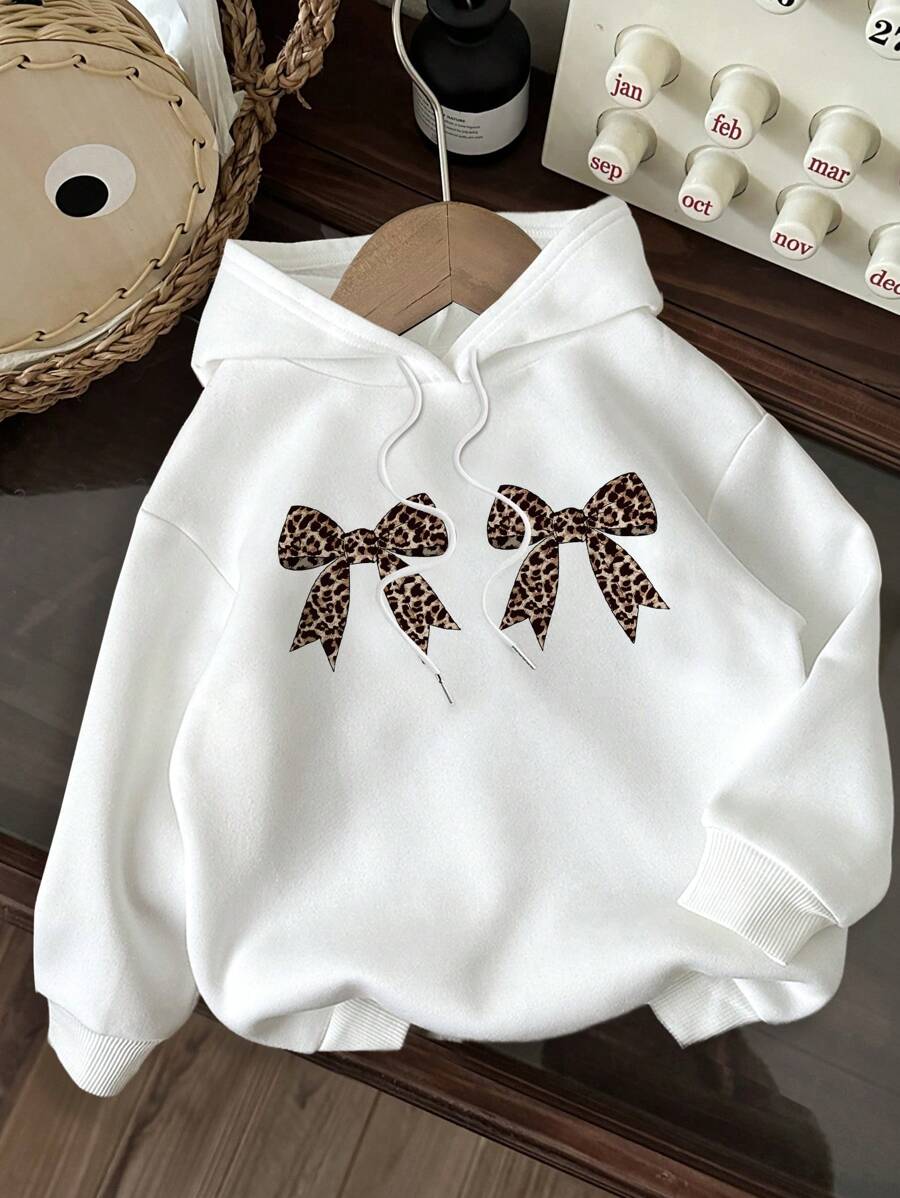 Attitoon Sweat-shirt à capuche décontracté et minimaliste en molleton ample, à manches longues, imprimé léopard et nœud, convient pour l'automne/l'hiver. Top à manches longues.