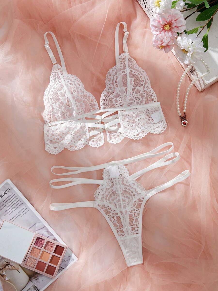 Set de 2 piezas de lencería de sostén y braga de encaje hueco de unicolor sexy para mujer