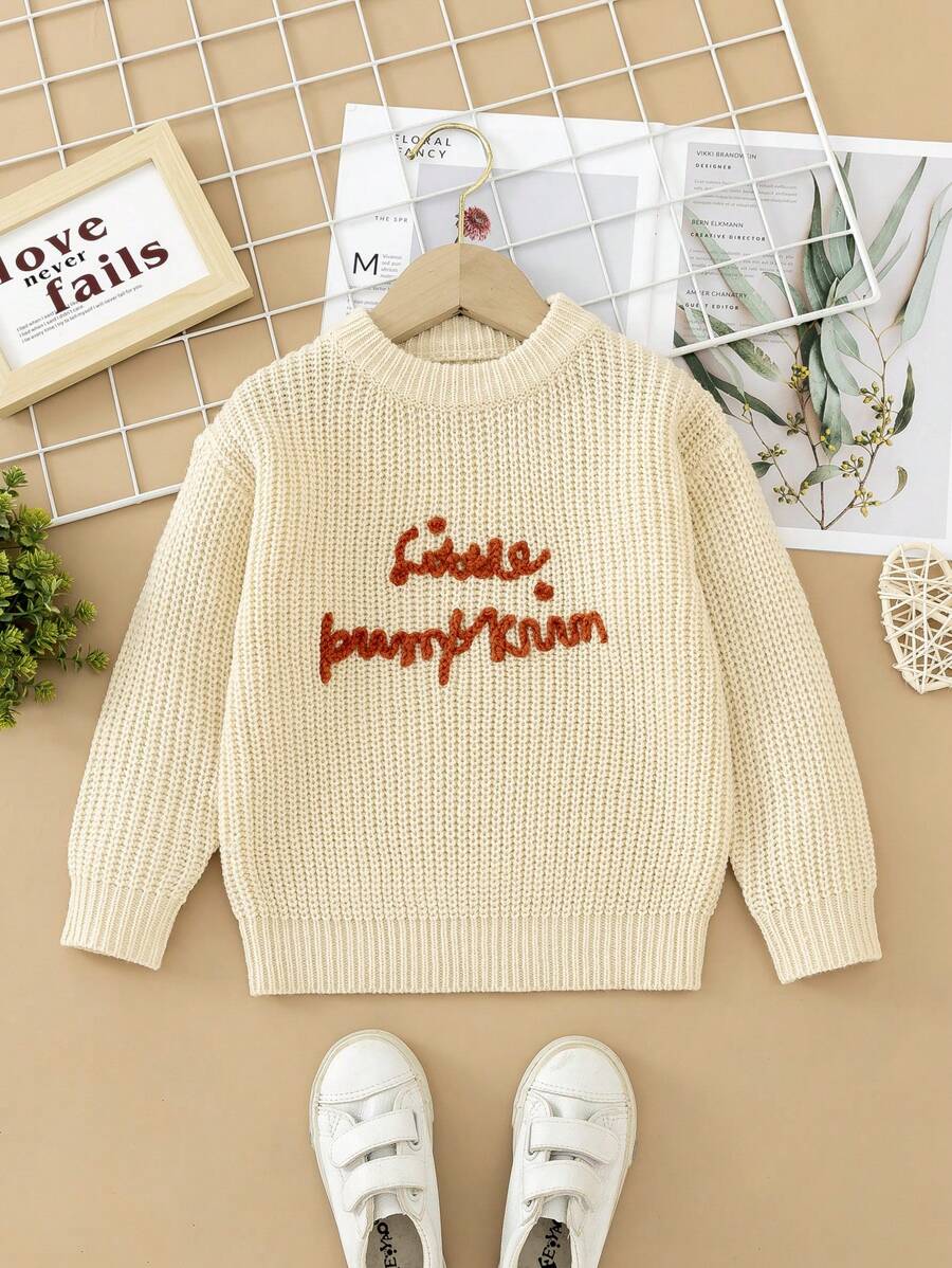 Jersey de niña, hecho de un cálido color albaricoque, con un encantador gráfico de calabaza en inglés en el pecho, que aumenta los elementos divertidos y de moda. Adecuado para usar en jardín de infantes, escuela primaria y otros entornos escolares, también aplicable para reuniones familiares, Halloween, Año Nuevo, Acción de Gracias, Navidad, Pascua, Día Nacional, bailes, Nochevieja