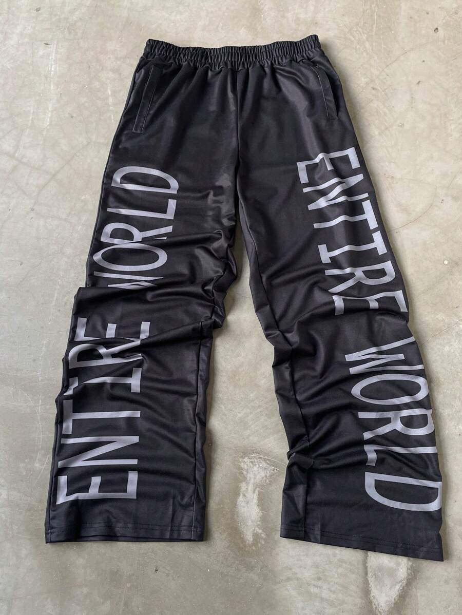 Manfinity Streetrush Pantalones deportivos casuales sueltos con estampado gráfico de letras, cintura elástica con bolsillo, para salir en otoño, ropa de calle holgada, regalo para el esposo o novio