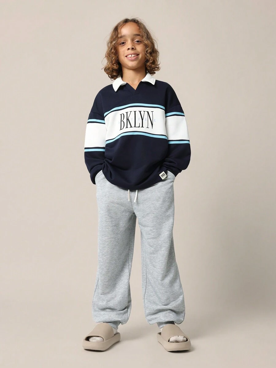 SUMWON Conjunto de 2 piezas con sudadera tipo polo y pantalón jogger de ajuste relajado regular para niños preadolescentes