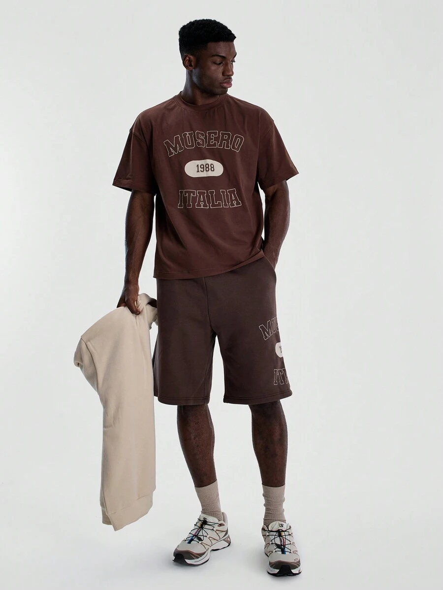 Musero Pantalones cortos tipo jogger de corte holgado con estampado gráfico para hombre