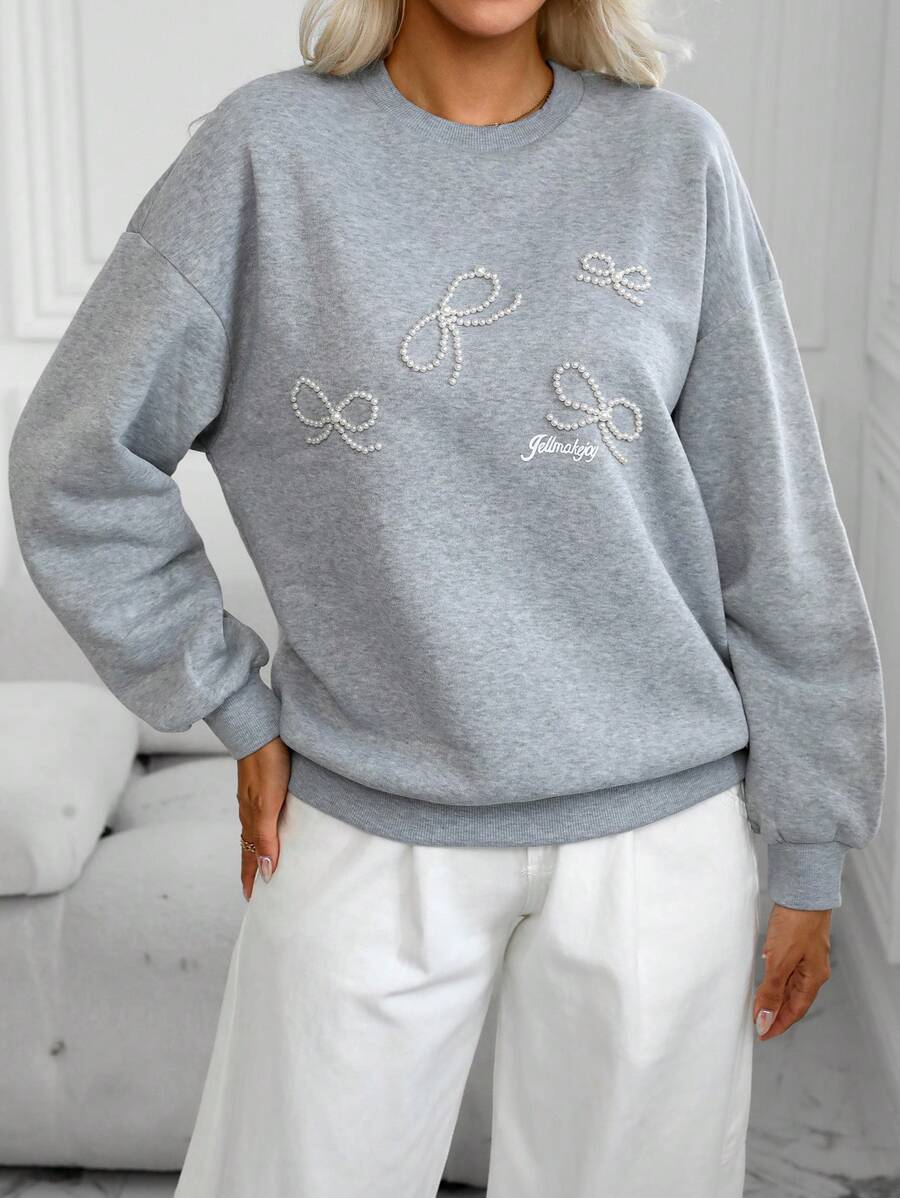 SHEIN LUNE New Autumn Fashion Casual Pearl Bow Round Neck Long Sleeve Print Women Sweatshirt Pullover Fall Outfit