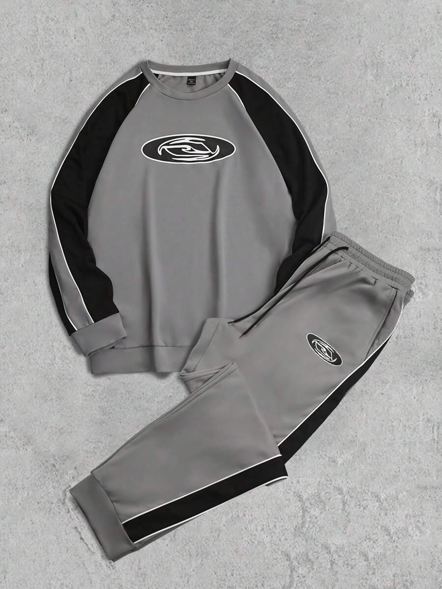 Manfinity LEGND Conjunto casual de sudadera y pantalón de chándal con cuello redondo y manga raglán con estampado de letras para hombres talla grande, otoño