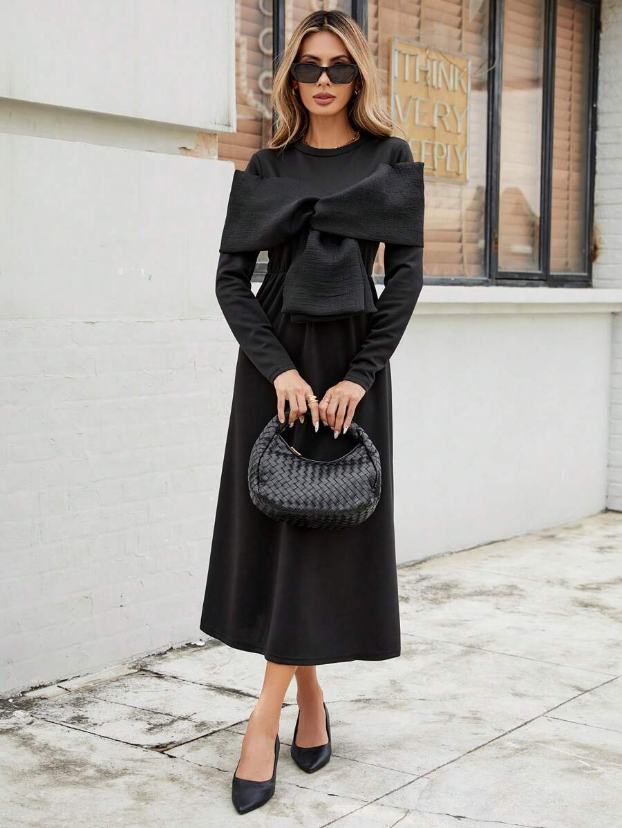 Calvaya Dames Modieuze Mesh Super Bow Ronde Hals Getailleerde Zwarte Lange Mouw Splice Design Taille Uitlopende Zoom Jurk
