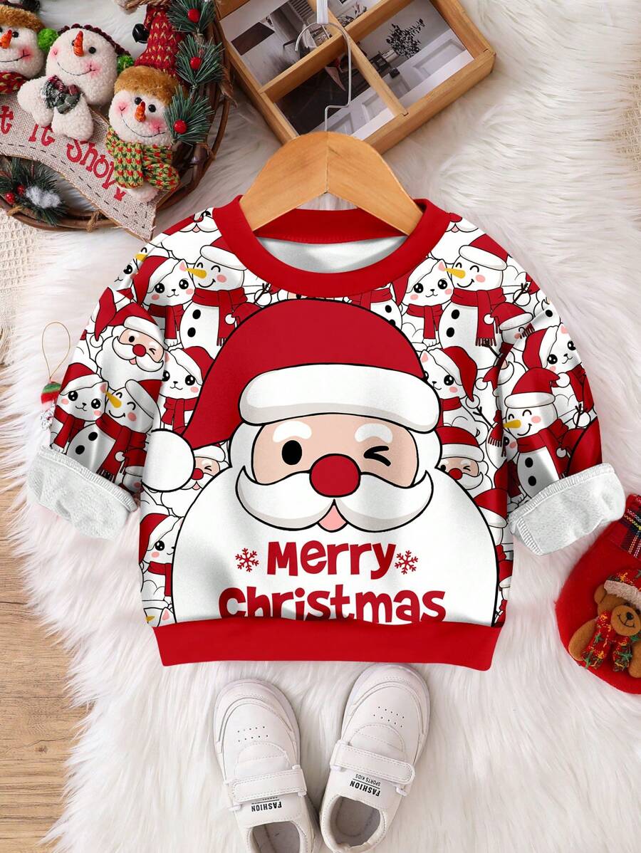 SHEIN Sweatshirt en tricot confortable à manches longues pour jeunes garçons, col rond, style décontracté et ample avec éléments de Noël, convient pour l'automne/l'hiver
