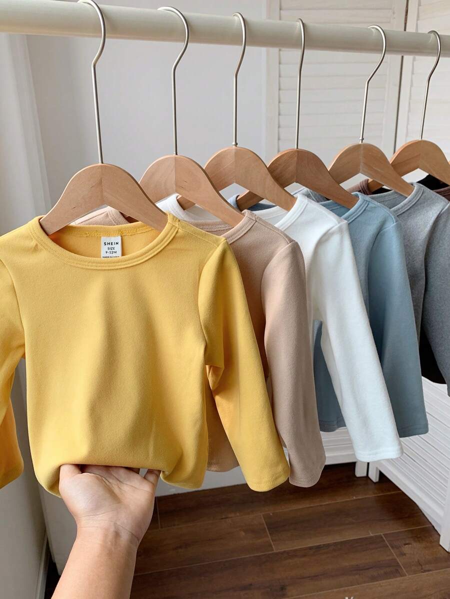 SHEIN Conjunto de 7 camisetas de manga larga de punto de unicolor, ideales y versátiles para niños y niñas pequeños en otoño/invierno