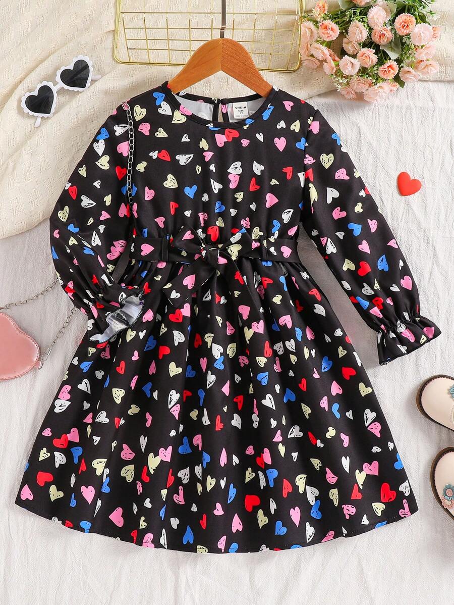 Vestido casual y lindo con estampado de corazones, cuello redondo y mangas campana para niña, otoño