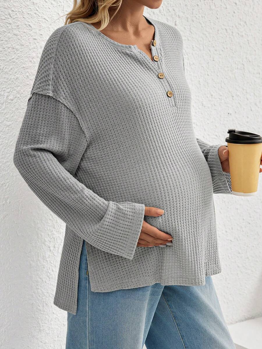 SHEIN Camiseta de maternidad con hombros caídos y bajo dividido, para la temporada de otoño