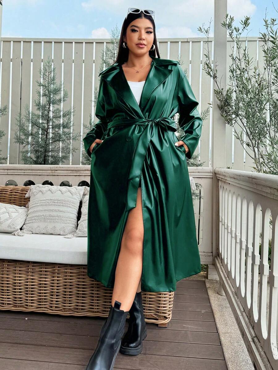 Flirla Plus Size Women Fashion Street Style Solid Color PU Leather Lapel Collar Slanted Pockets Belted Long Trench Coat