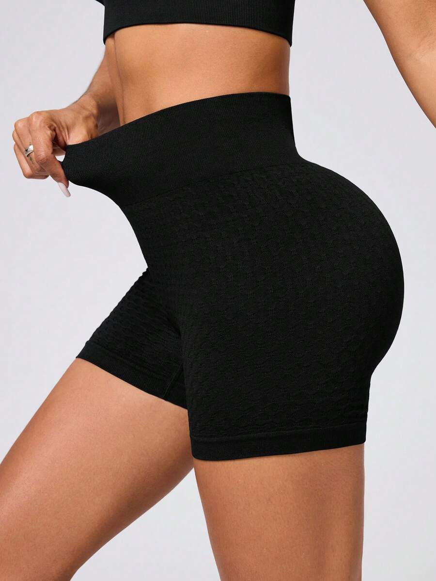 SHEIN Sport Studio Pantalones cortos deportivos sin costuras con cintura elástica de unicolor para el verano, adecuados para yoga y ejercicio