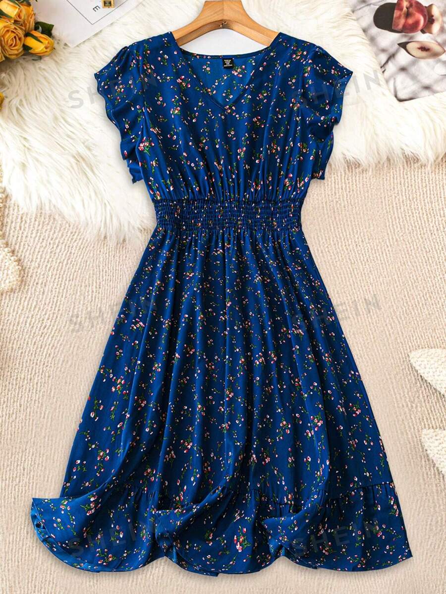 SHEIN Clasi Vestido informal de talla grande con cuello en V sin mangas y estampado floral todo sobre todo