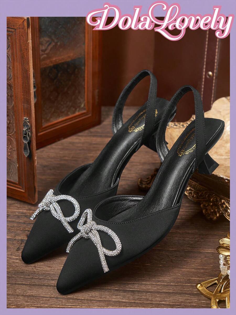 Dola Lovely Talons stilettos à bout pointu noir avec nœud papillon pour femmes