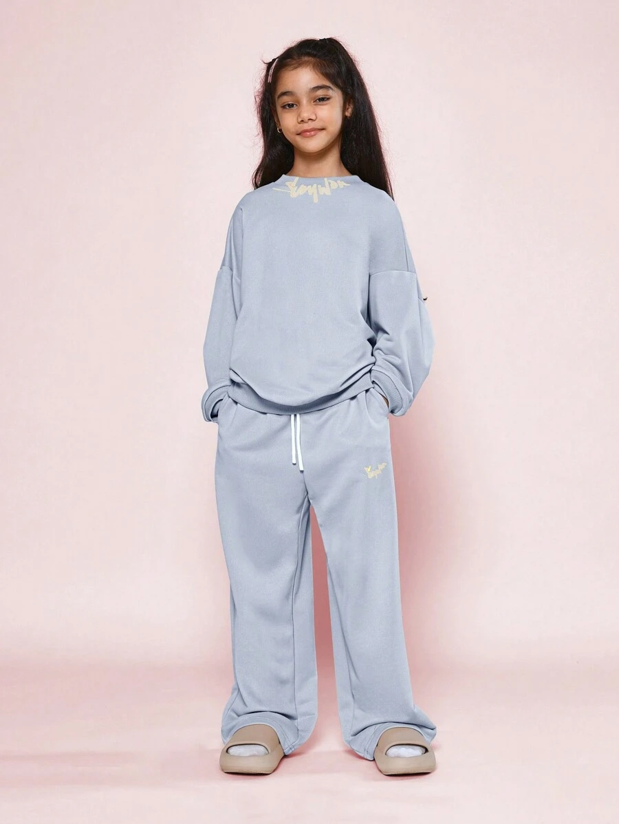 SUMWON Conjunto de 2 piezas para niña preadolescente con sudadera cuello redondo cómoda con estampado gráfico en el cuello y pantalón de chándal de corte recto