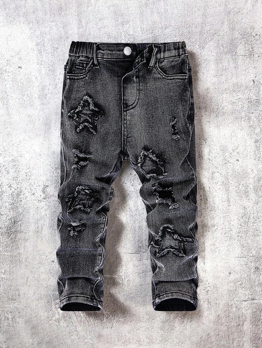 SHEIN Jeans noirs slim déchirés, élimés et rapiécés avec imprimé d'étoiles, style mode pour jeune garçon. Confortable et polyvalent pour les tenues d'extérieur d'automne/hiver pour enfants
