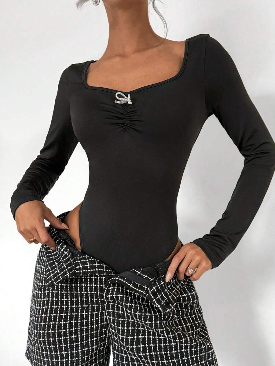 Chiquease Women's Sweetheart Neck Ruched Front Rhinestone Bow Decor Long Sleeve Bodysuit
