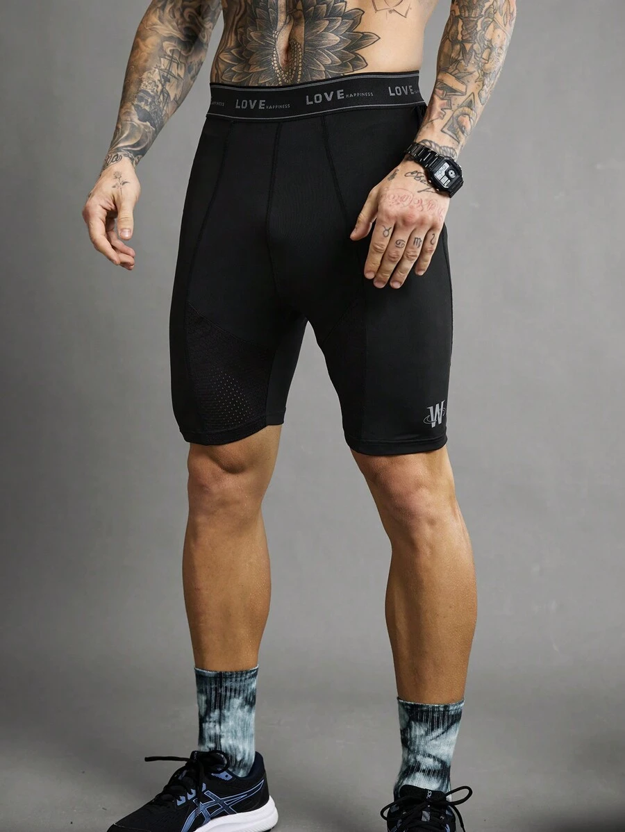 Manfinity Sport Polished Pantaloncini sportivi aderenti da uomo con fascia in costina a righe