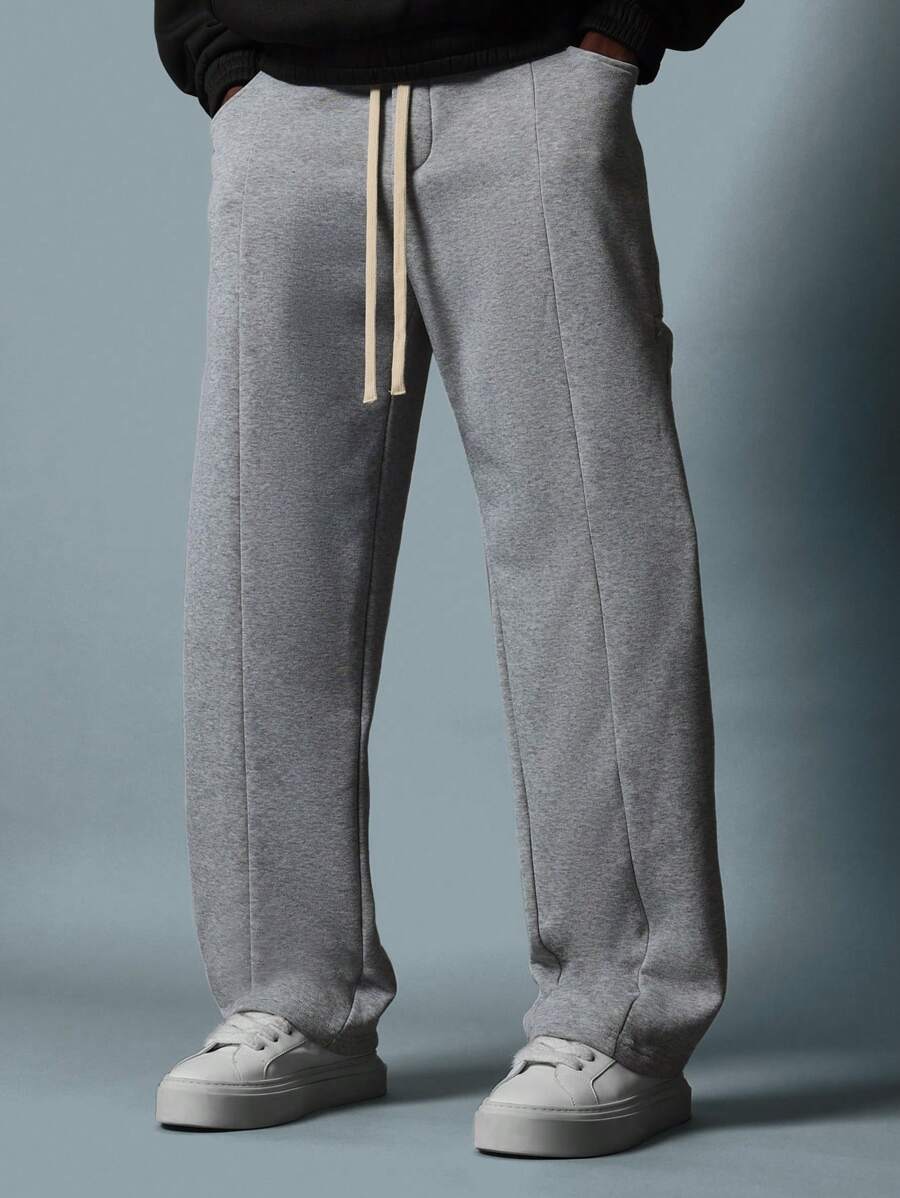 SUMWON Pantalones deportivos premium de ajuste suelto estilo jogger, cómodos y de forro polar para el invierno, para hacer ejercicio o descansar, con cordón y bolsillos laterales