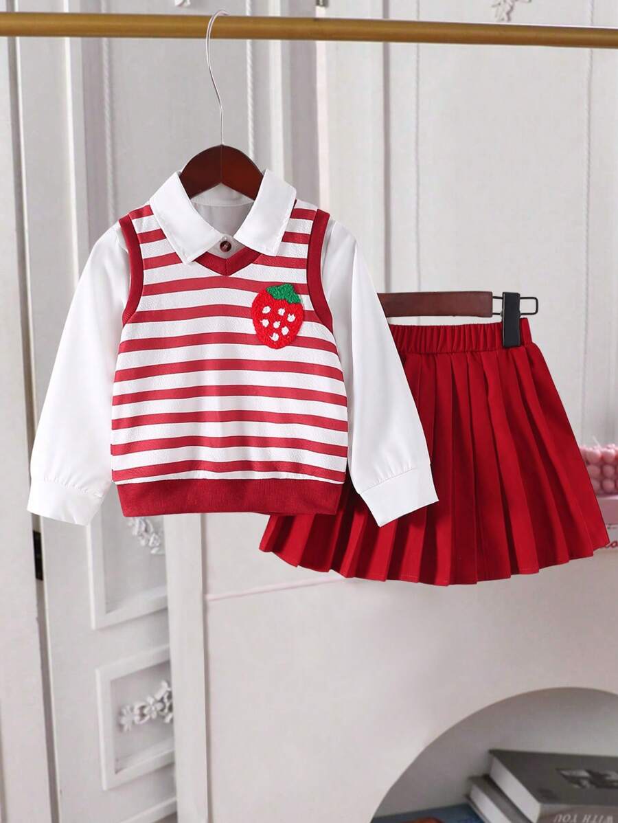 SHEIN Conjunto de 3 piezas para niña con: Blusa de manga larga estilo academia con cuello de solapa y hombros caídos en color blanco, Camiseta sin mangas con escote en V, con bordado de fresas a rayas, y Falda plisada de cintura alta en color liso