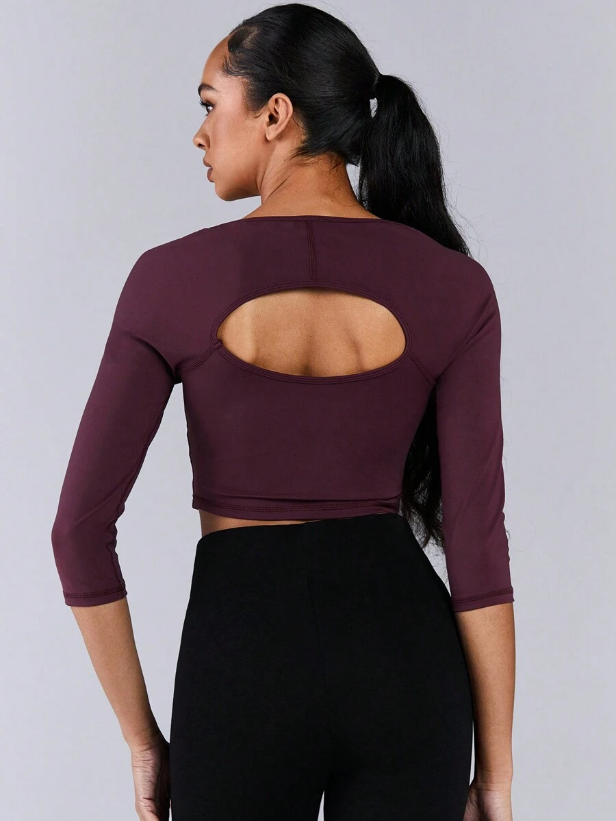 Athîral Top casual deportivo sólido de manga larga, cuello redondo, espalda abierta y diseño sencillo para mujer