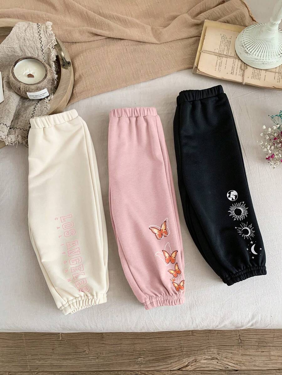 SHEIN Set de 3 pantalones de niña bebé con diseño de patrones de dibujos animados y cintura elástica, adecuados para otoño/invierno