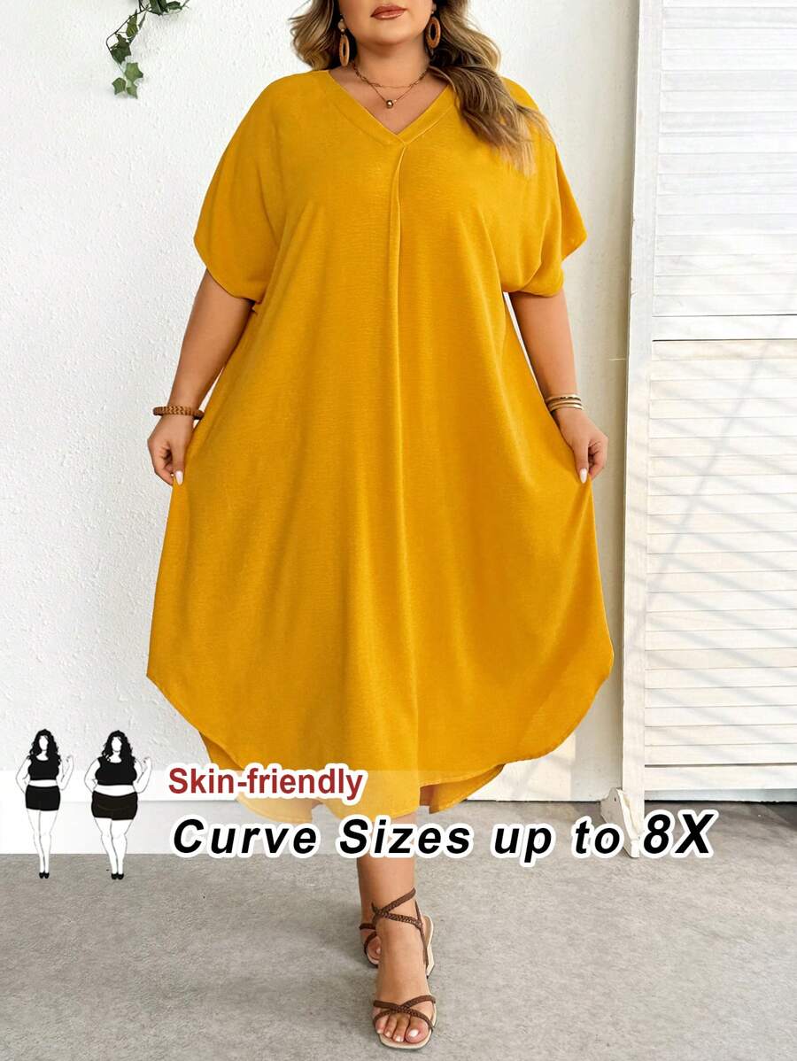 SHEIN CURVE+ Vestido casual de playa de talla grande de unicolor con cuello en V