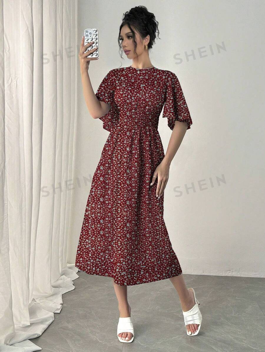 Calvaya Vestido casual de longitud media de manga corta con volantes, cuello redondo, cintura acampanada y estampado floral diminuto, para vacaciones románticas en color azul