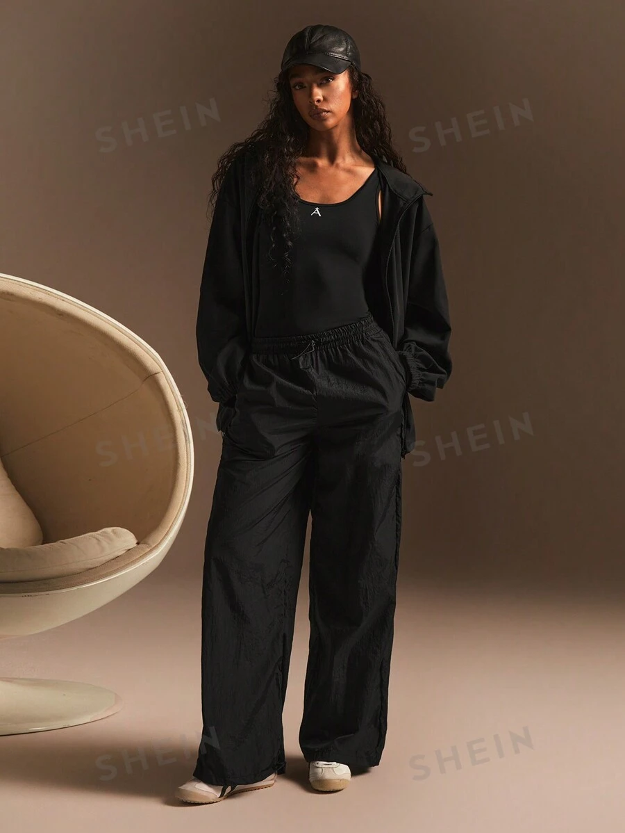 Athîral Pantalón de chándal informal suelto de pierna ancha con bolsillos y cordón en la cintura de color liso para mujeres