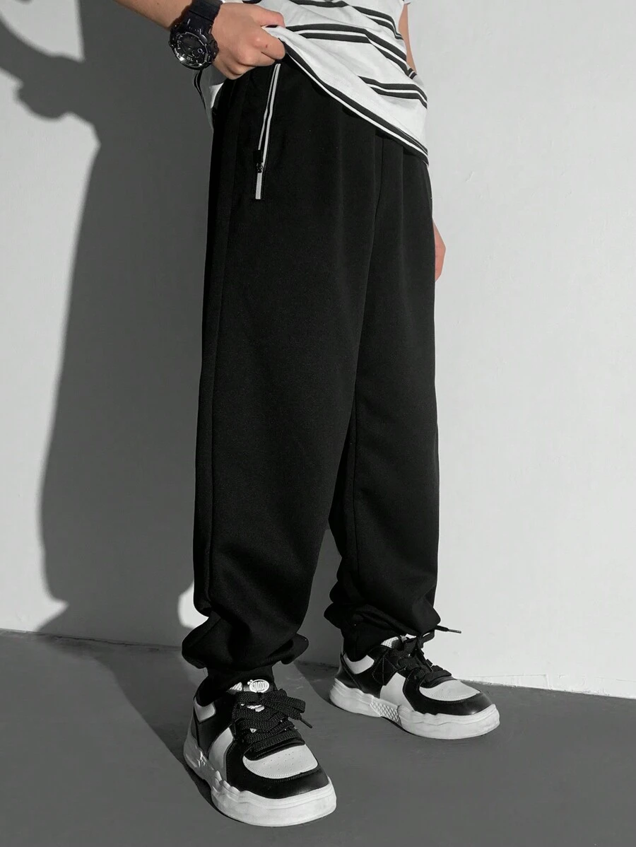 SHEIN Minimalistische mode casual trainingsbroek met rits voor jongens, dagelijkse kleding