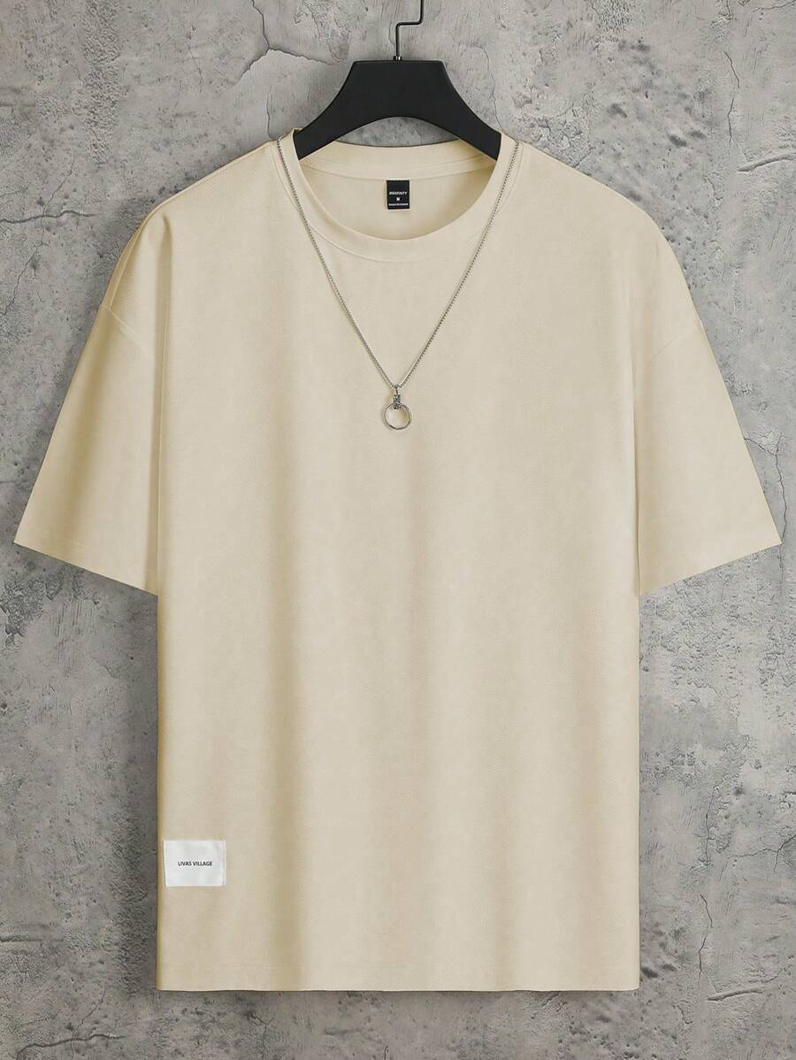 Manfinity Homme Men's Letter Print Loose Fit Casual Round Neck Short Sleeve T-Shirt