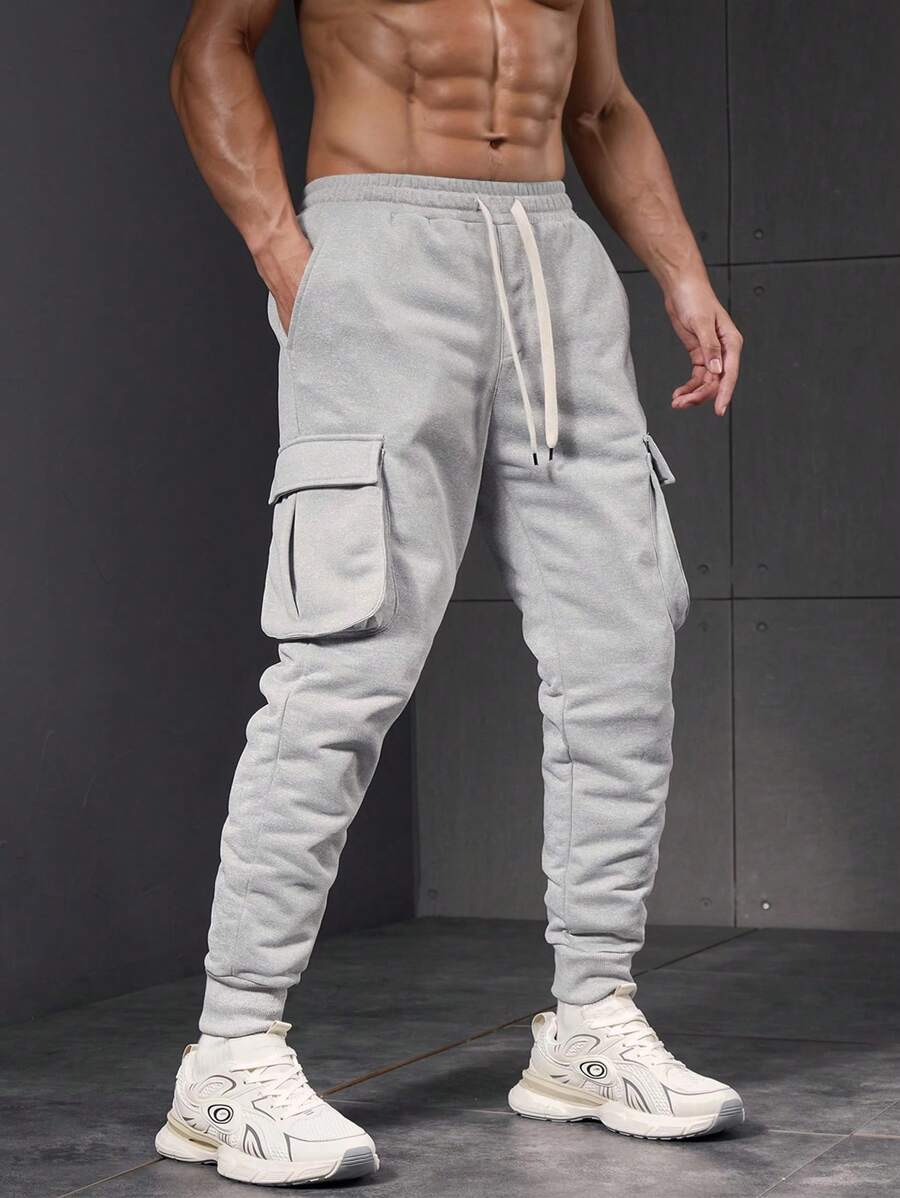 Manfinity Sport PWRUP Pantalon de sport pour hommes à taille élastique et liens aux chevilles, minimaliste et décontracté
